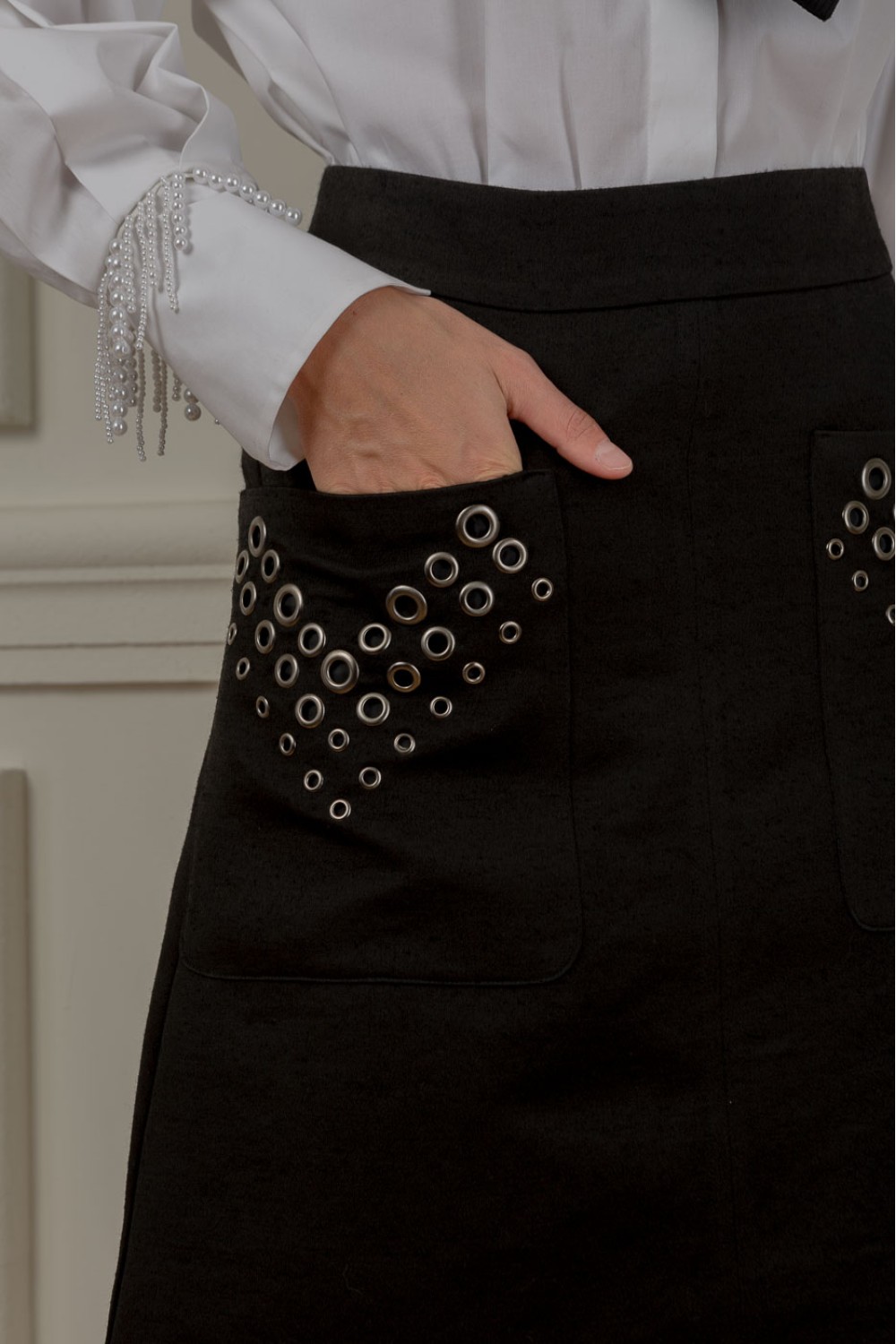 Gloucester skirt decorated with eyelets
