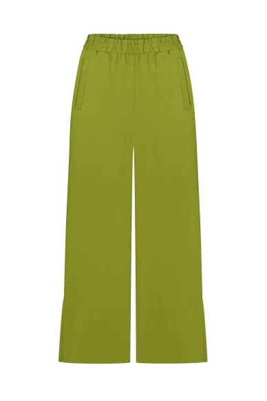 Green linen trousers with slits by Trembel - photo