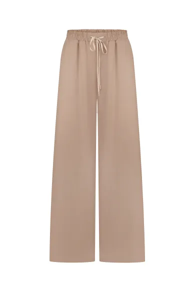 Широкие льняные брюки на резинке песочного цвета Мадлен - фото