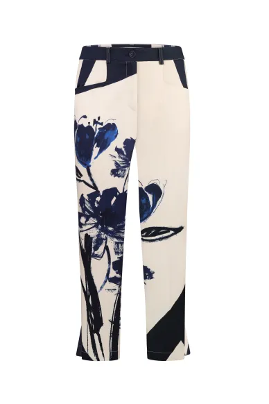 Хлопковые принтованные брюки в бело-синем цвете Флаура - фото